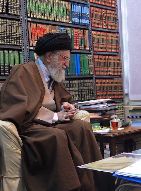 Photo: Ayatollah Khamenei in his personal study and library.