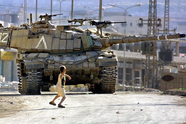 Palestinian boy Israeli tanks